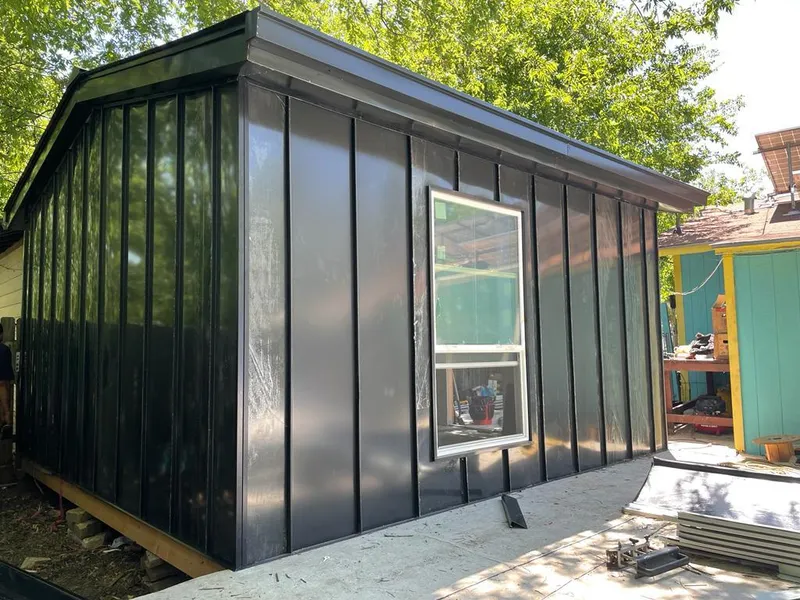 Black standing seam metal wall panels for Metal Roof Installation in Laplace